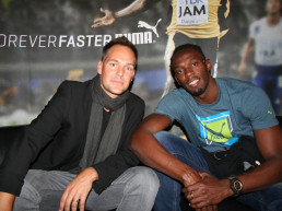 Buchautor & Keynote-Speaker Axel Rabenstein mit Superstar Usain-Bolt beim Interview